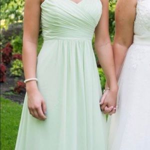 Light green bridesmaid dress.